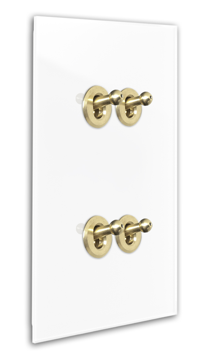 Modern design light switch in white glass optic with 4 brass toggle levers. Cambridge